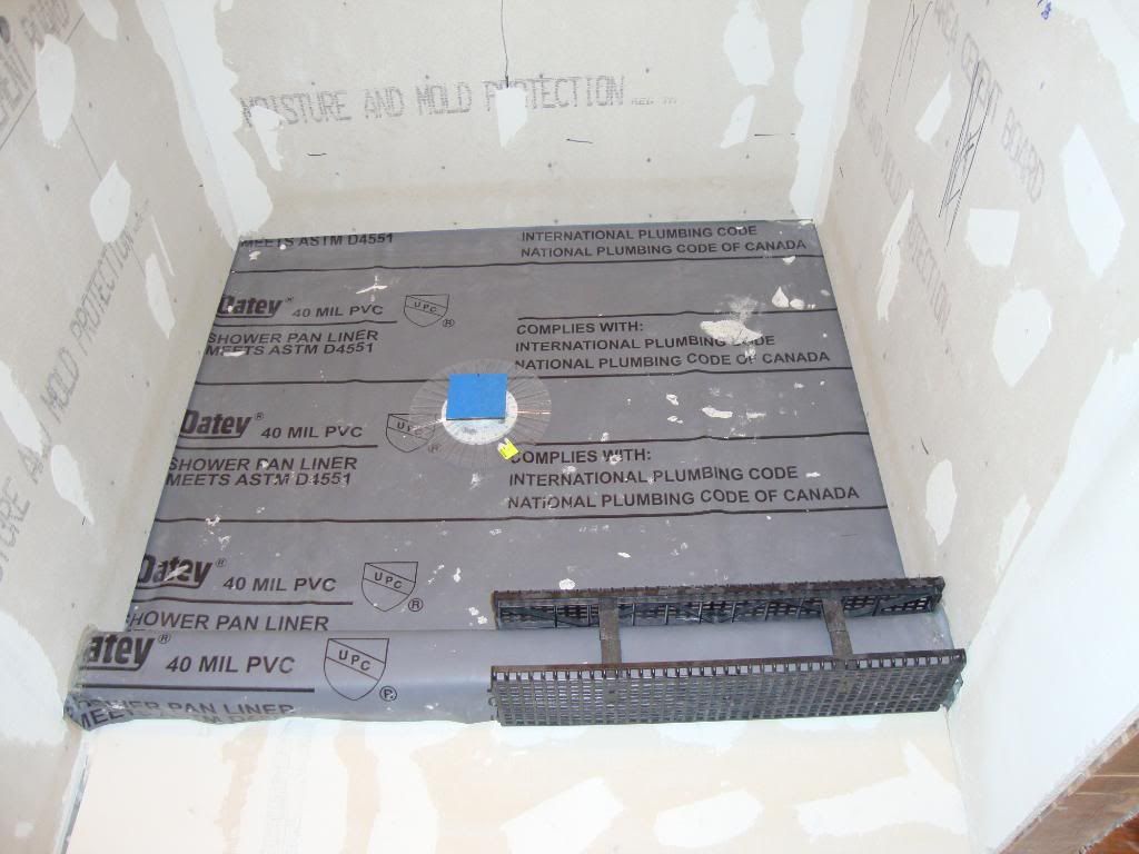 new tile shower leaking AGAIN